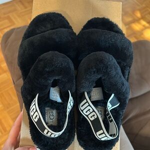 All black UGG OH YEAH slides.